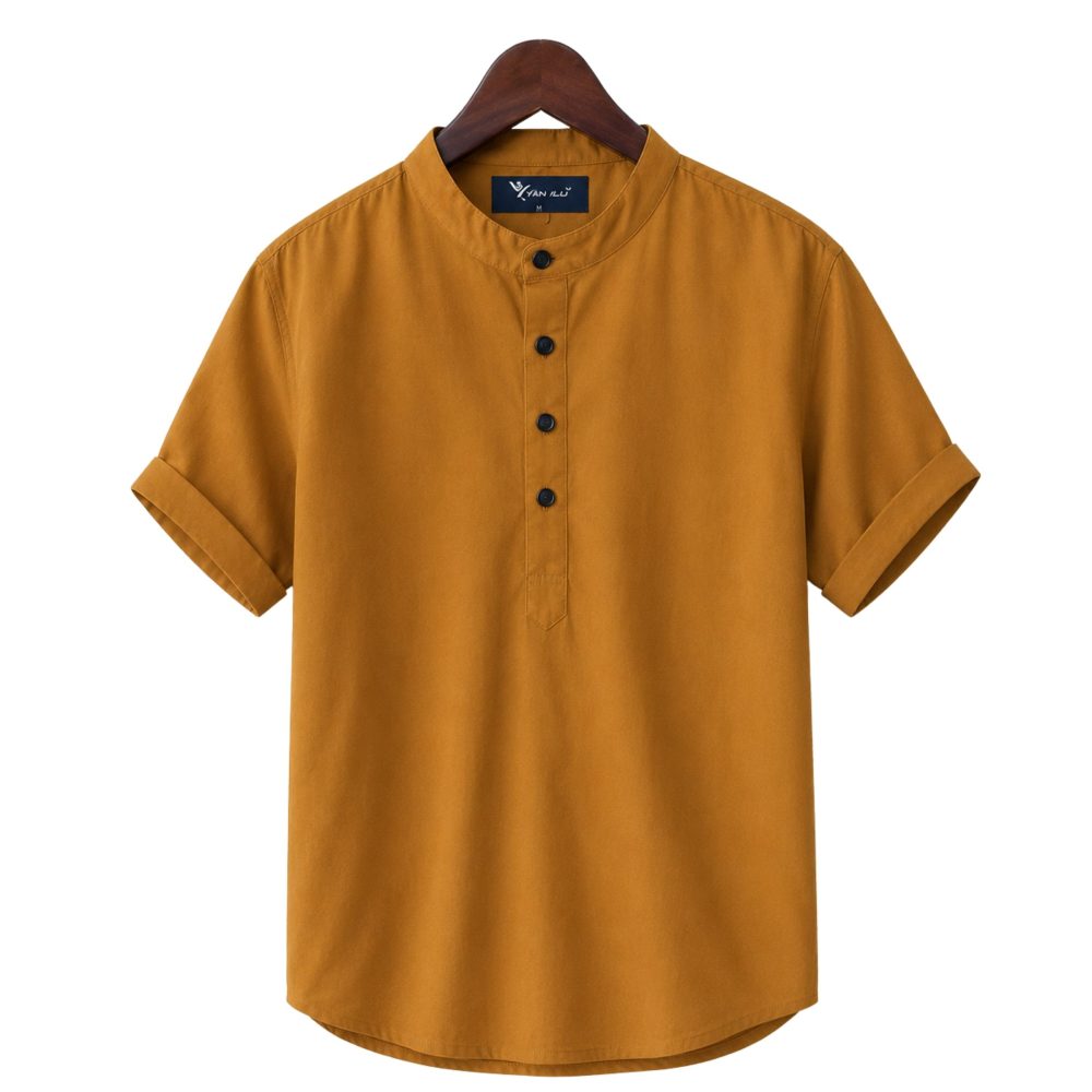 "Premium Men's Short Sleeve Katua Shirt in mustard colour made from 100% Oxford Cotton fabric with a Mandarin collar, half sleeves, and button placket, displayed on a wooden hanger against a white background.